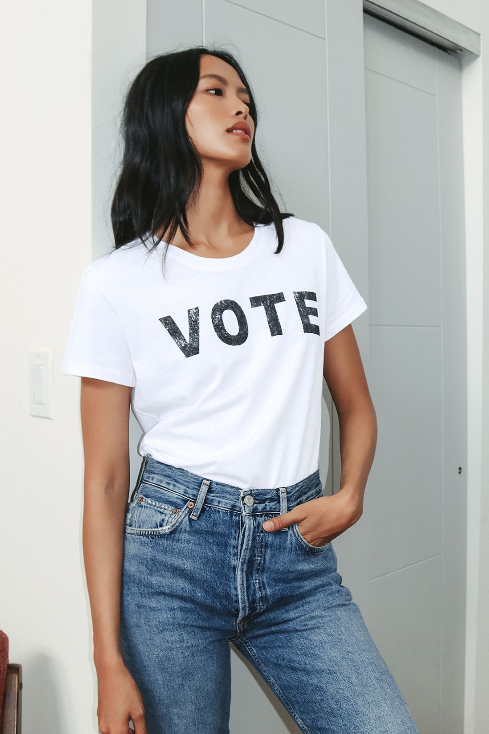 woman wearing one of lulus vote t-shirts