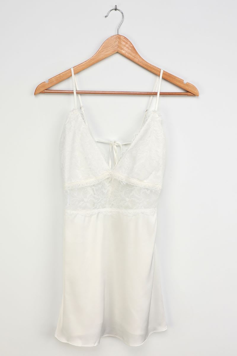 white satin lace slip dress on hanger