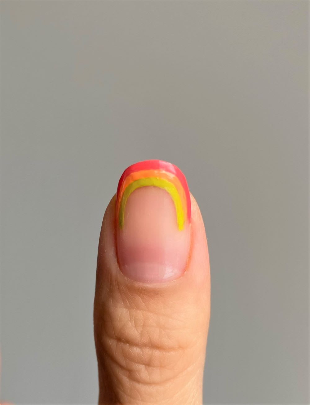 step 3 adding limey yellow line to rainbow nail tip