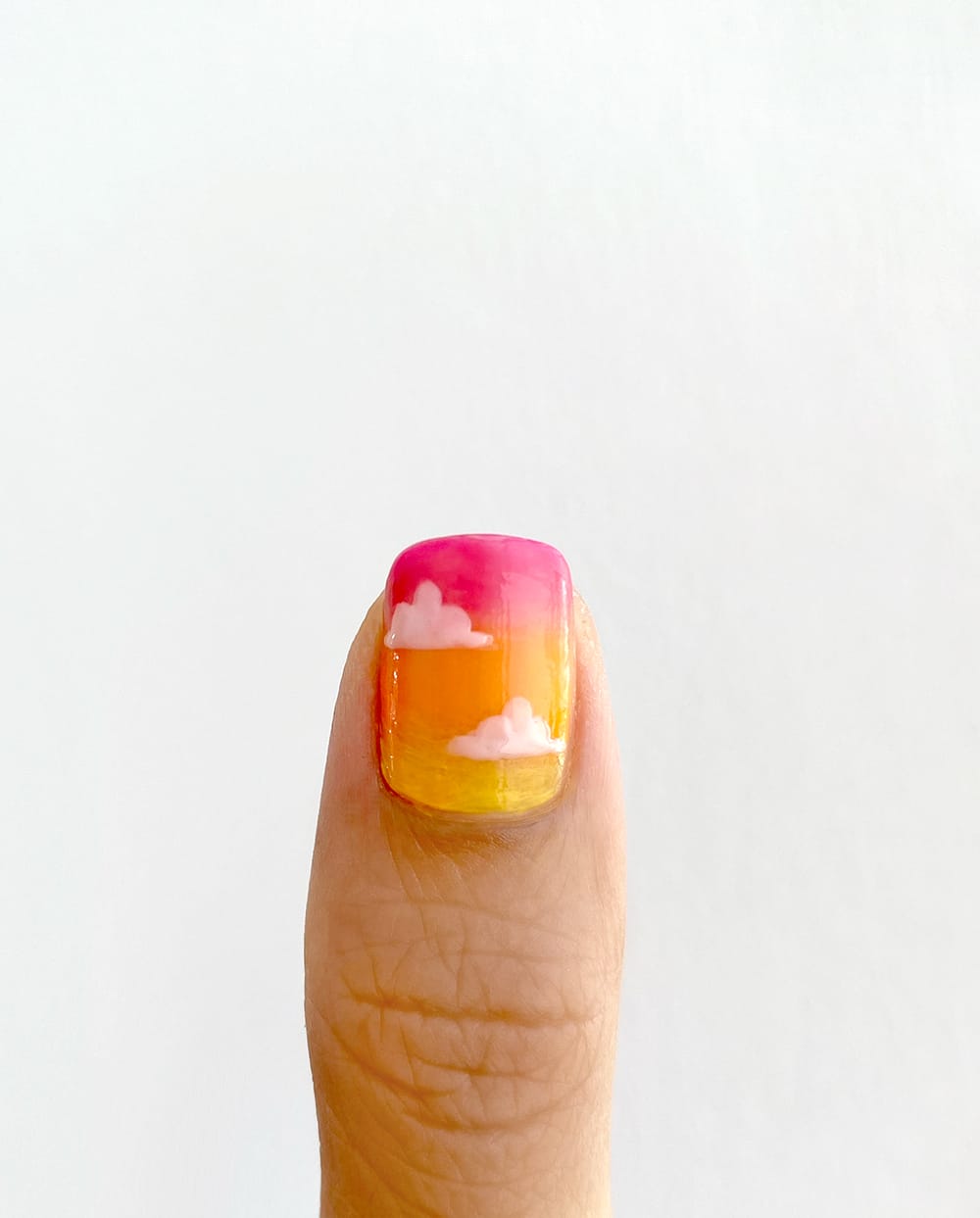 sunset desert nail with clouds