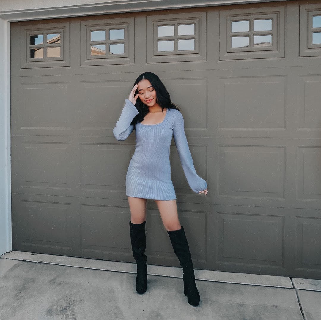dress with sweater and boots