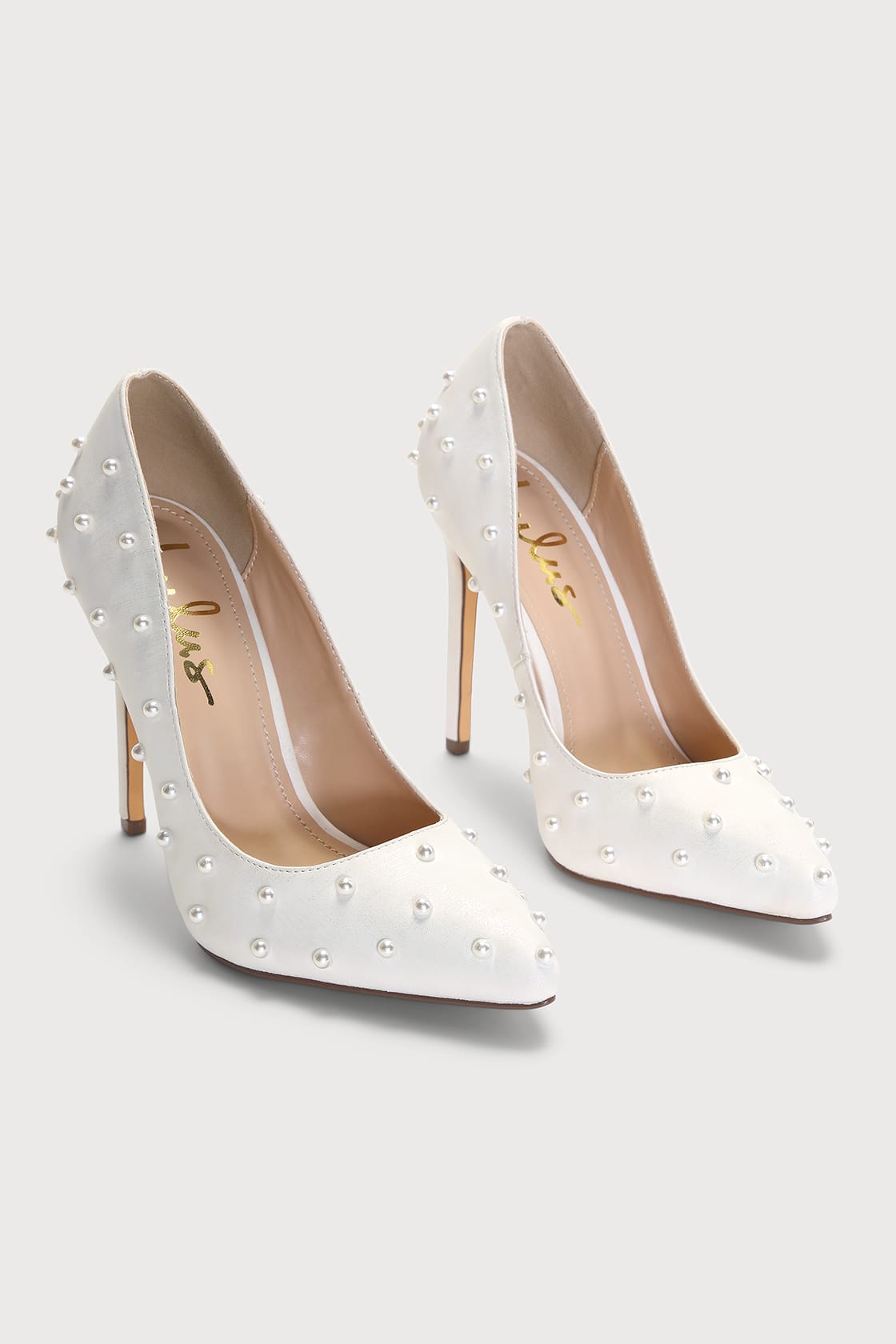 white pearl pointed toe pumps