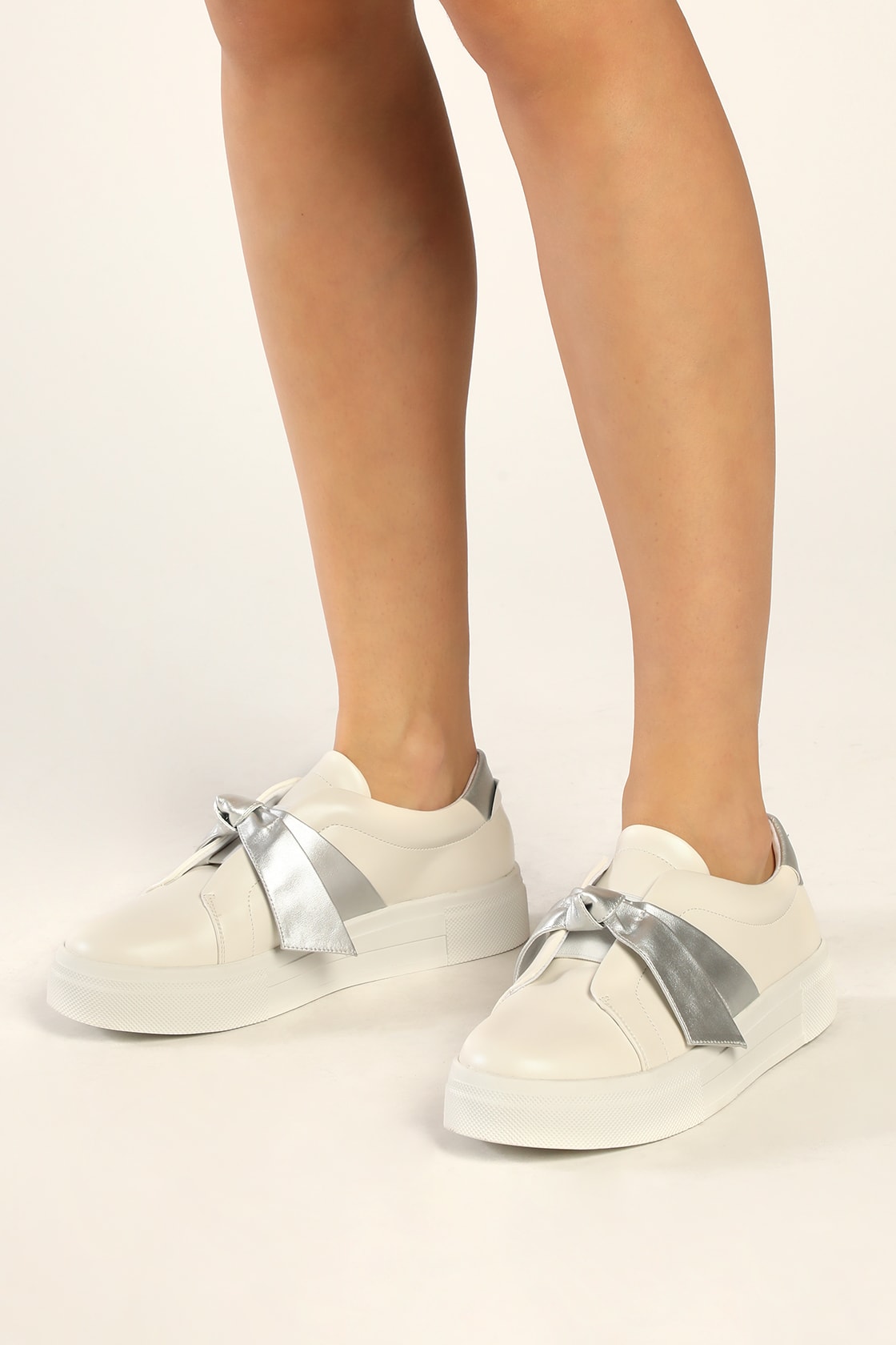 white silver bow sneakers