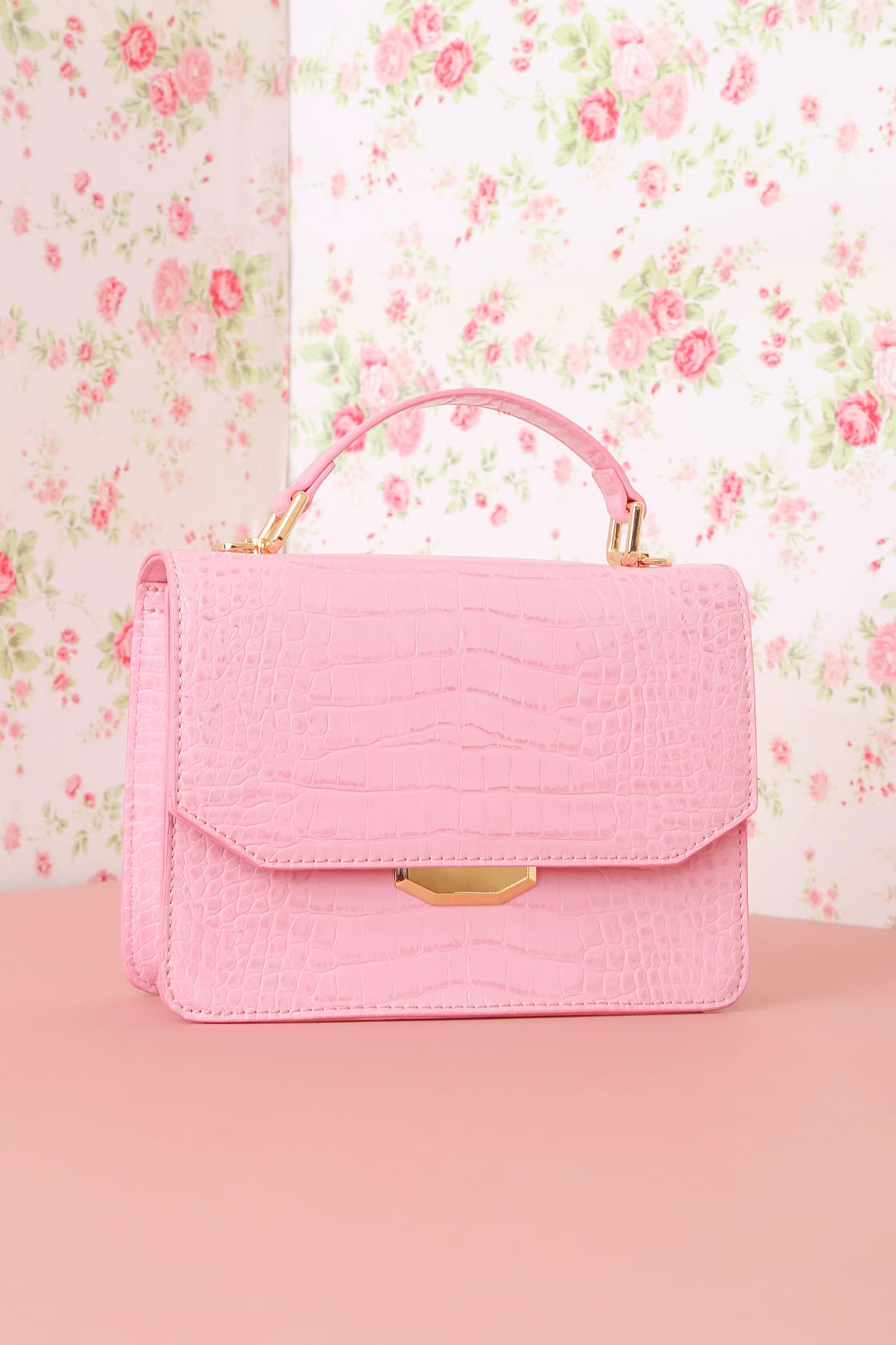 pink crocodile embossed crossbody bag