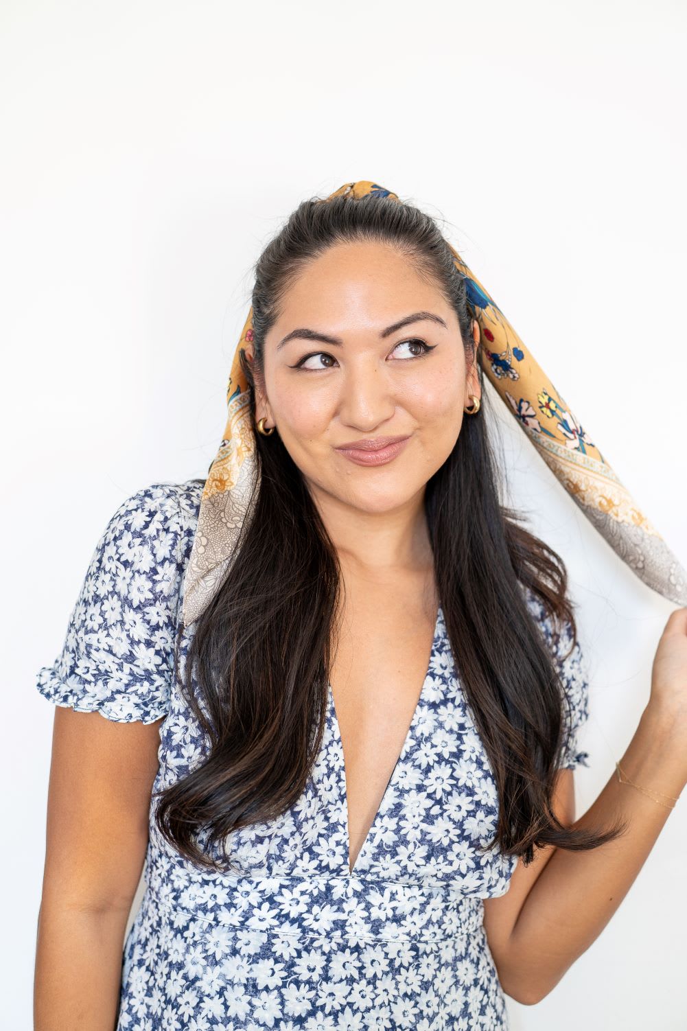 half hairstyle with satin scarf