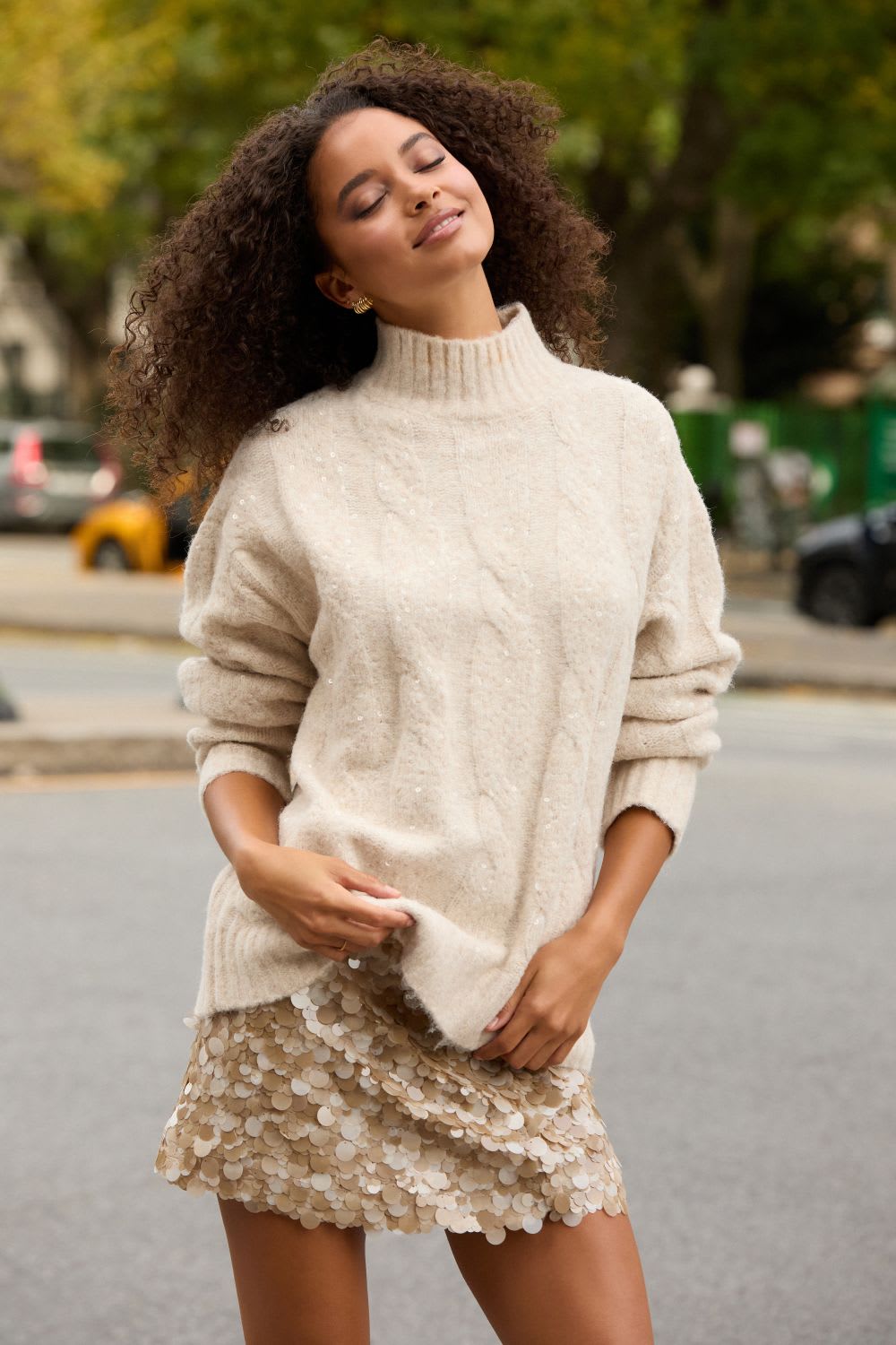 sweater and sequin mini skirt