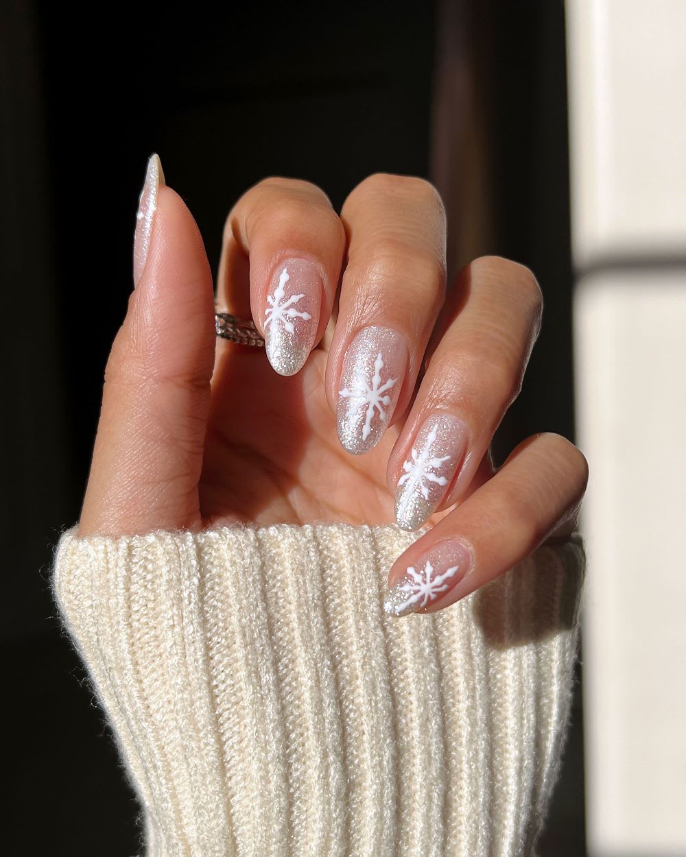 Female hands with winter nail design. Young woman hands with beautiful blue  manicure. Gentle winter manicure close up. Stock Photo | Adobe Stock