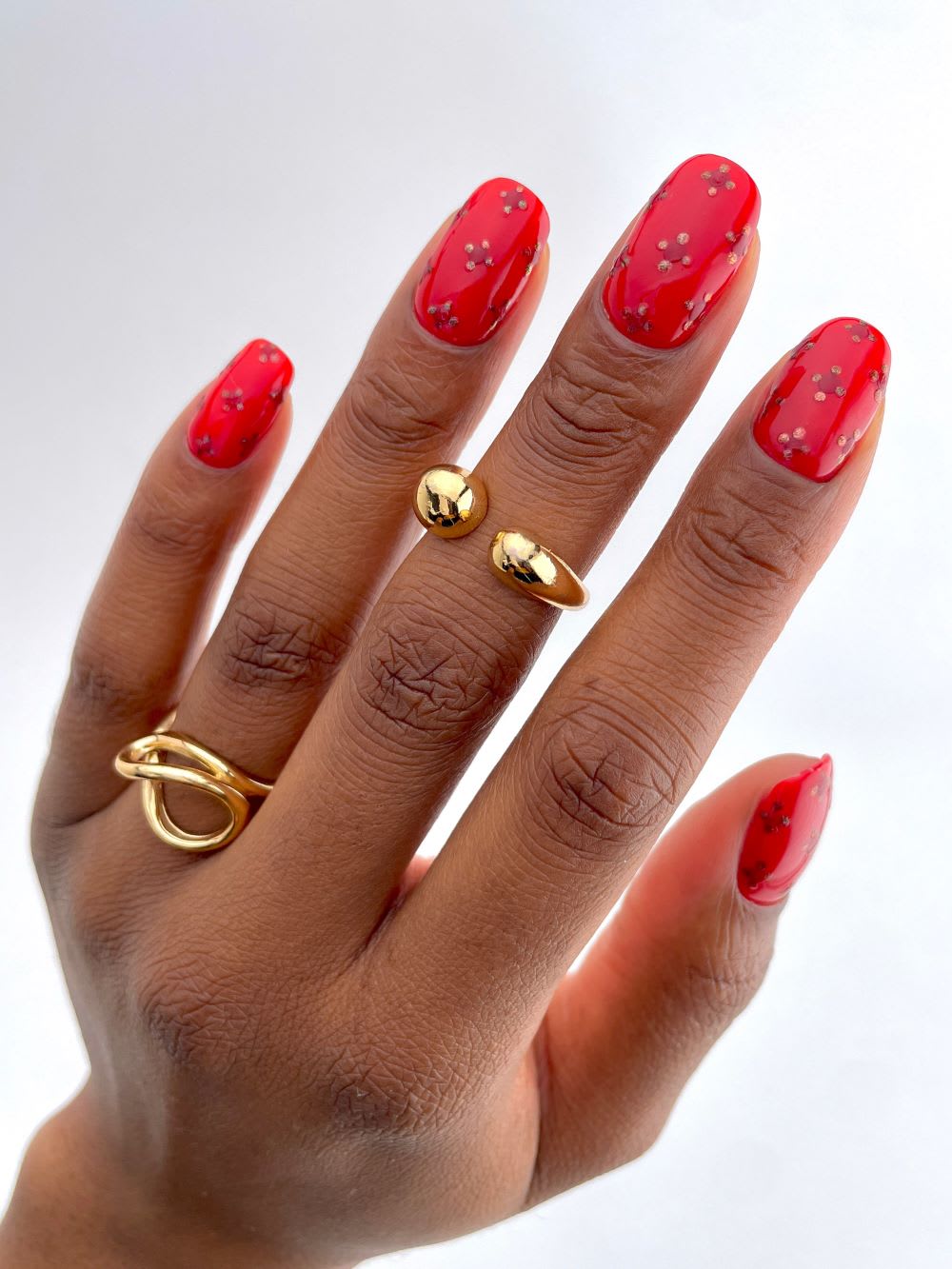 red prom nails with sparkle