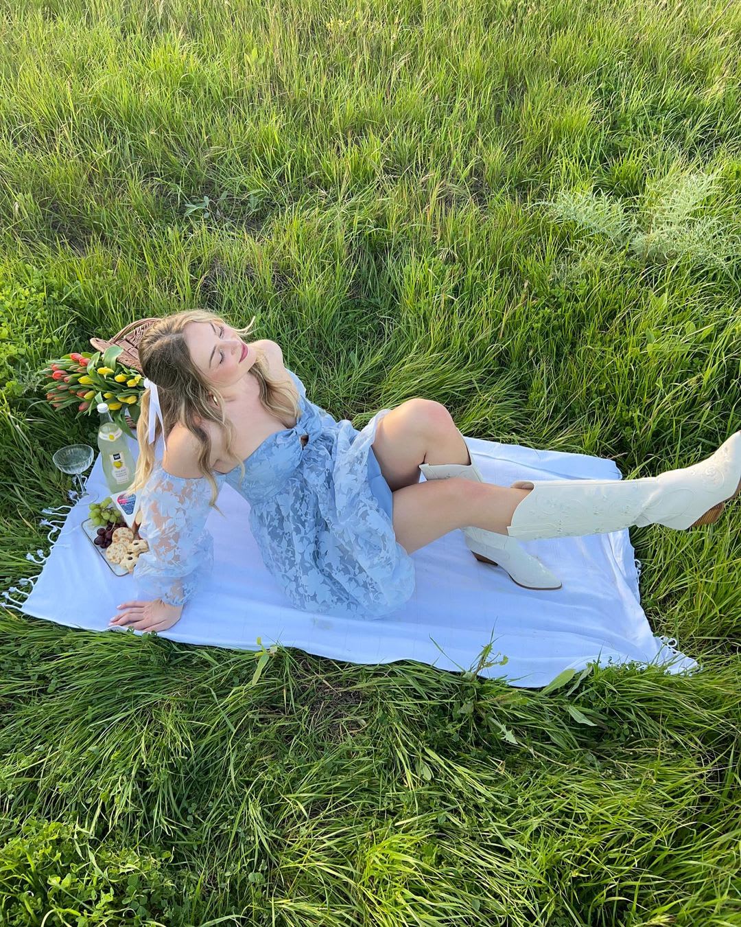 blue jacquard off the shoulder mini dress and western boots