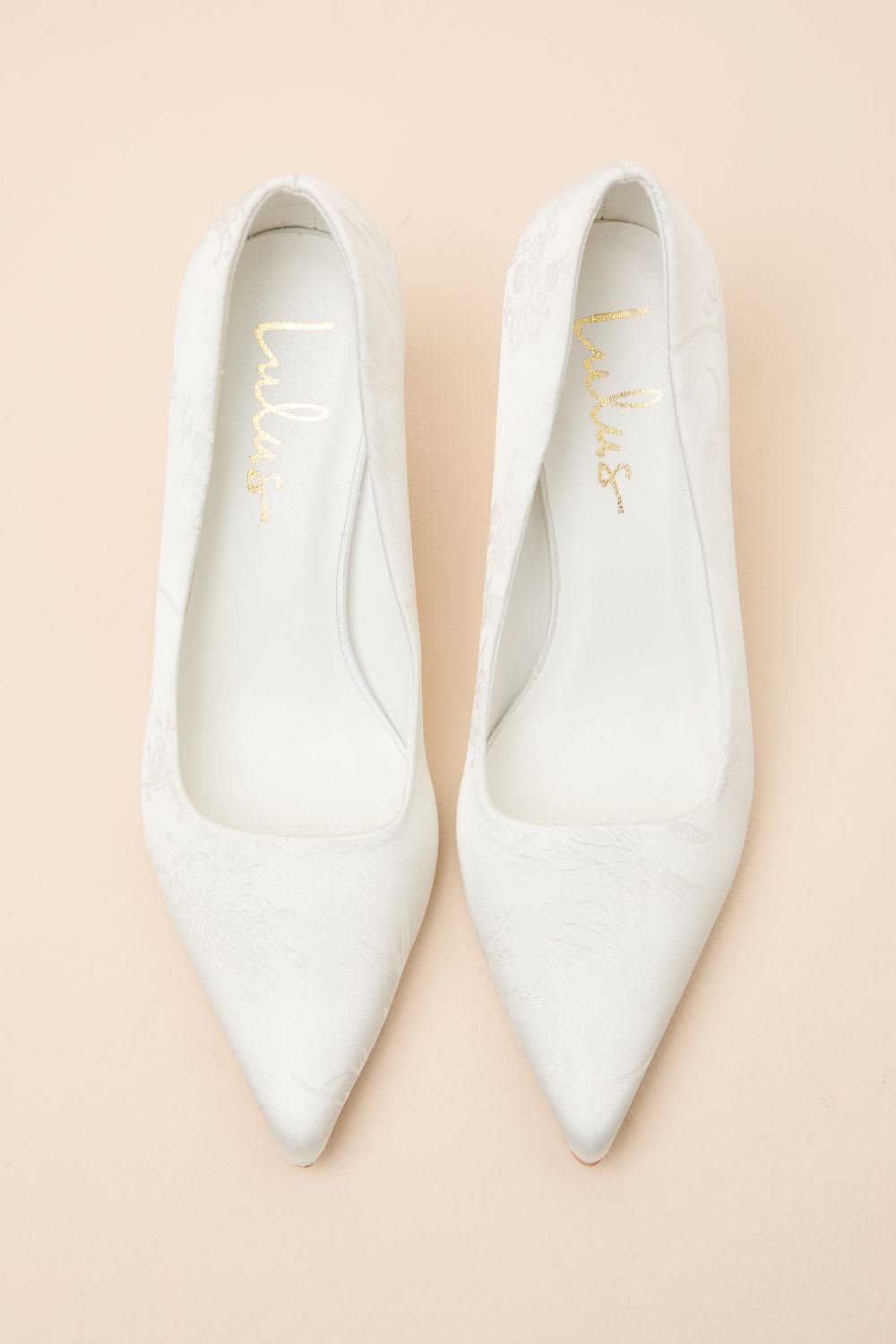 white jacquard pointed toe pumps