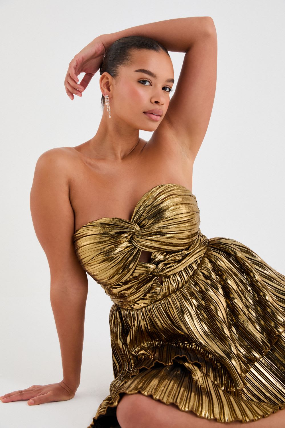metallic gold strapless pleated skater dress
