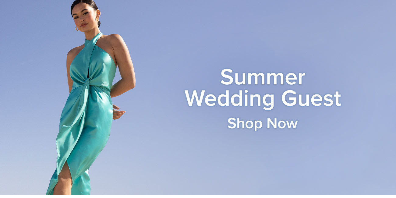 Summer Wedding Guest | Model in teal blue satin halter neck tulip midi dress