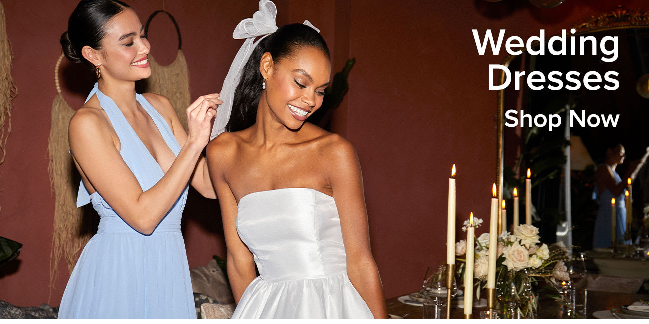 Wedding Dresses | Models in light blue bridesmaid and strapless white wedding dress