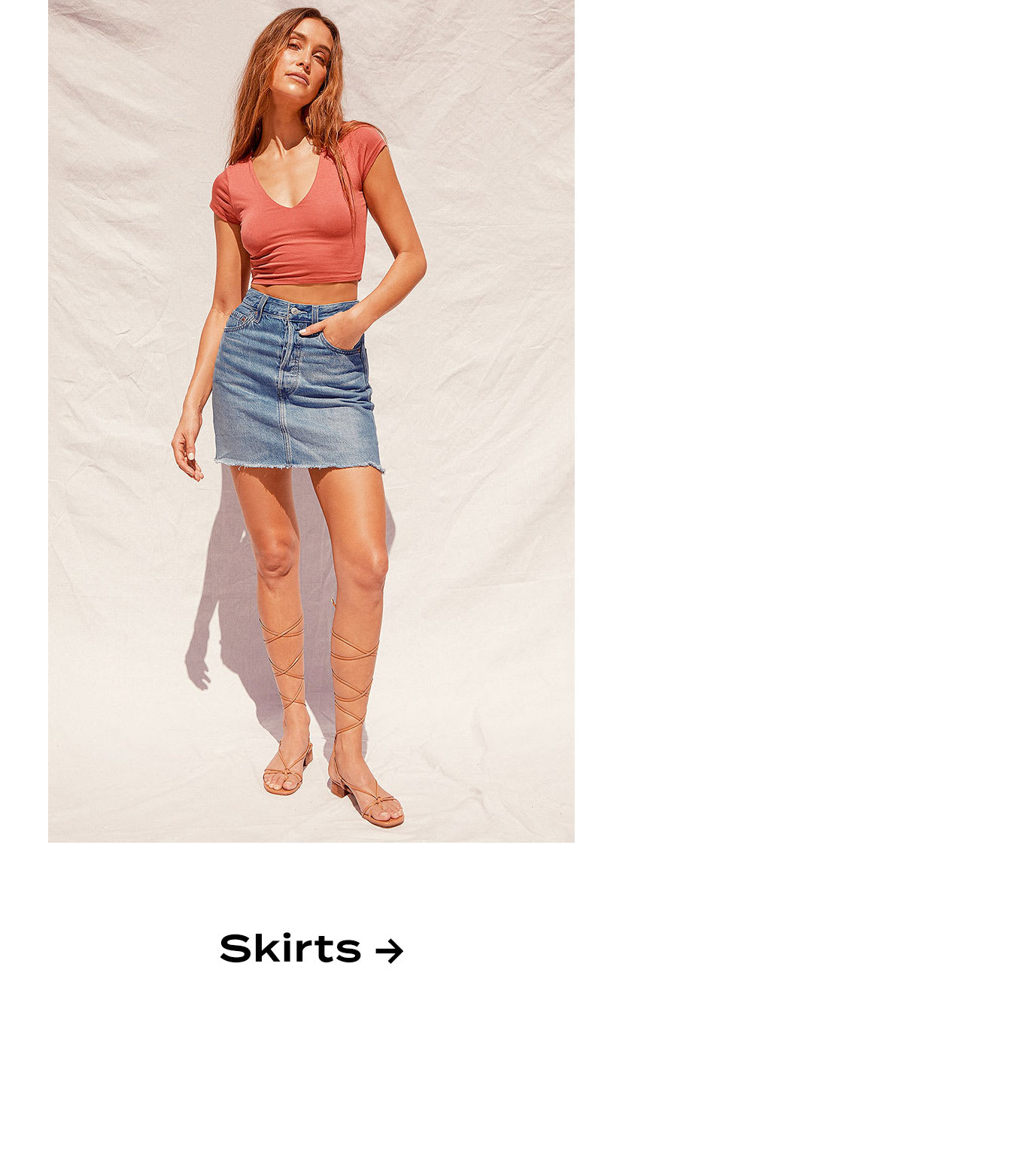 Model wearing denim mini skirt