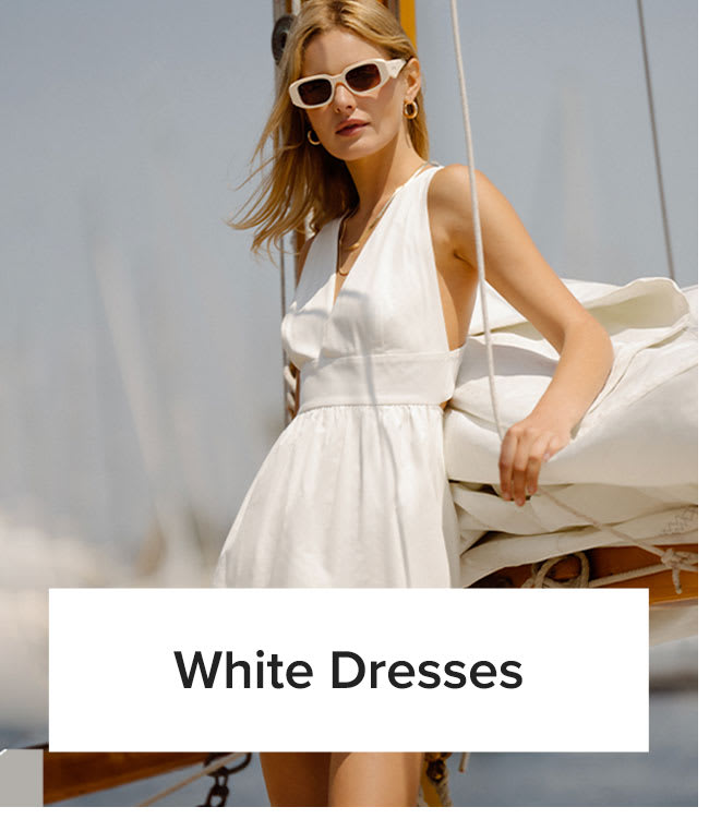 White Dresses | Model in white cutout lace-up v-neck mini dress