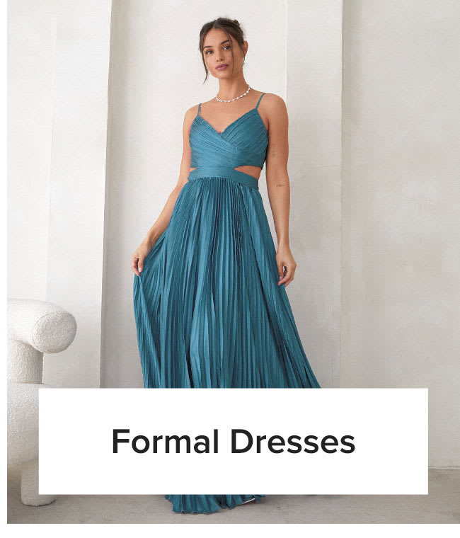 Formal Dresses | Model in teal blue pleated cutout maxi dress