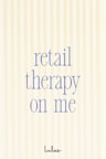 The gift card image, showing the text "Retail therapy on me" in blue lettering over a background of white and yellow vertical stripes