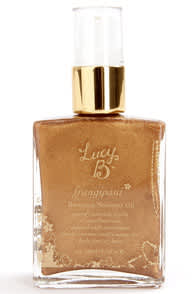 Lucy B Frangipani Bronzing Shimmer Oil at Lulus.com!
