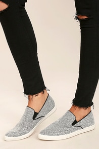 flat black and white shoes