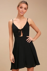 black dress with blush heels