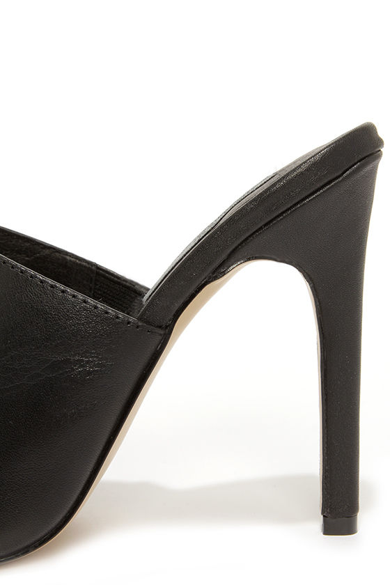 black leather pointed toe mules