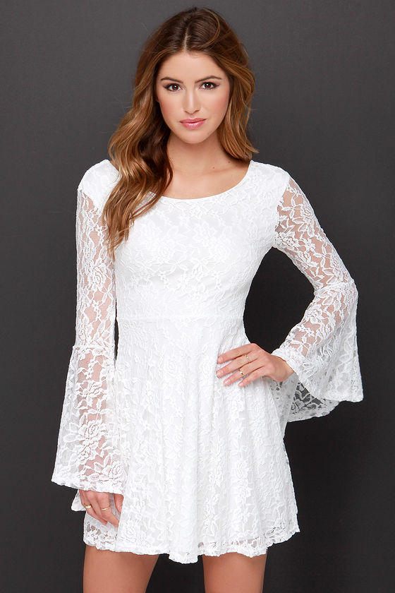 Image of white dresses with lace sleeves