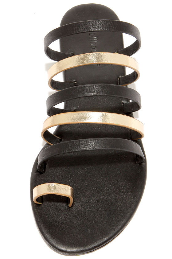 black sandals with gold trim
