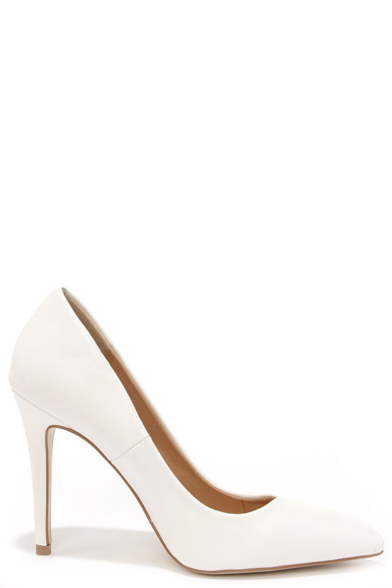 pointed white pumps