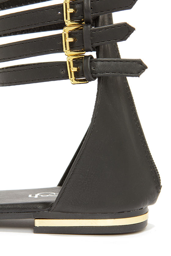 black caged gladiator sandals
