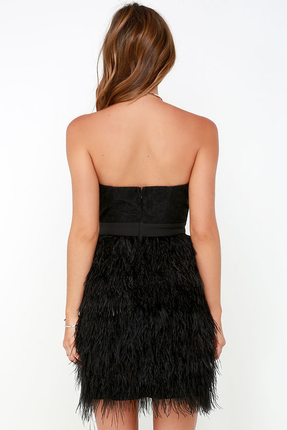 black dress with feathers on bottom