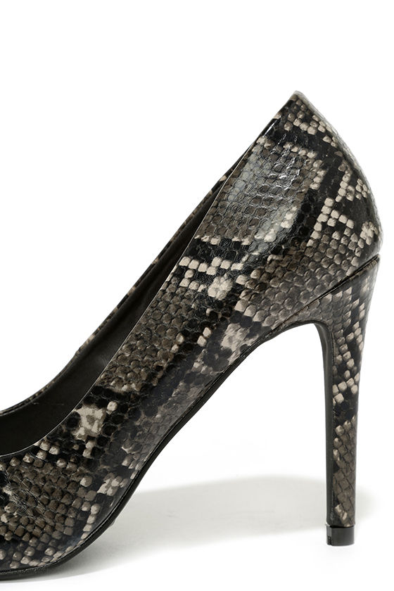 snakeskin flat pumps