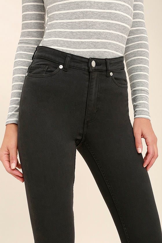 washed black skinny jeans