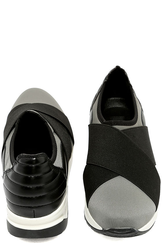 black and grey slip ons
