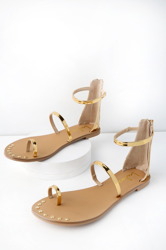 gold flat sandals with ankle strap