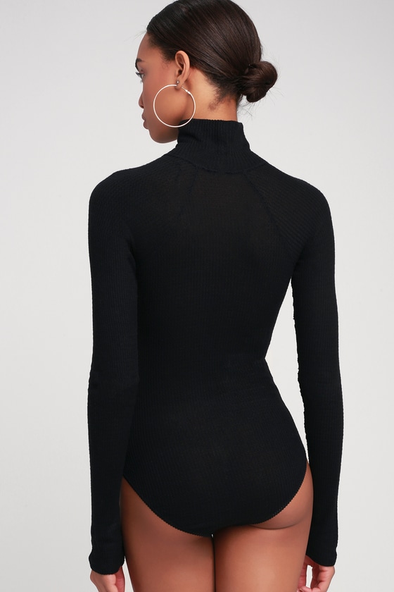 black fitted turtleneck bodysuit