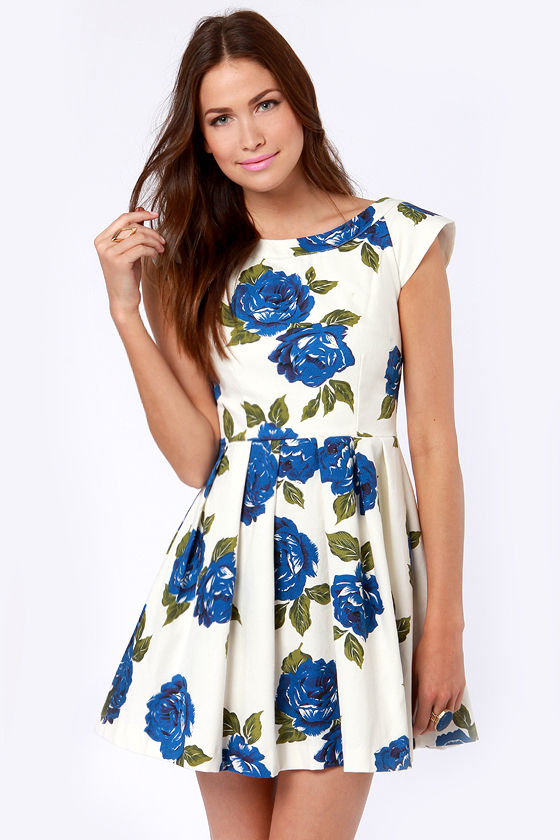 Image of white dresses with blue flowers