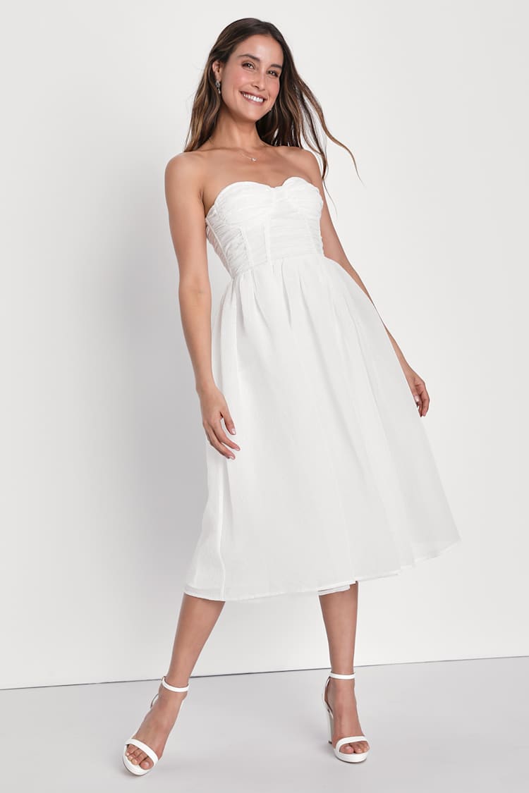 white beach dress midi Rihoas Vintage White Halter Dress with an Open Back & Bow
