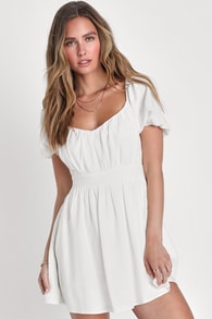 Effortlessly Endearing White Puff Sleeve Smocked Mini Dress