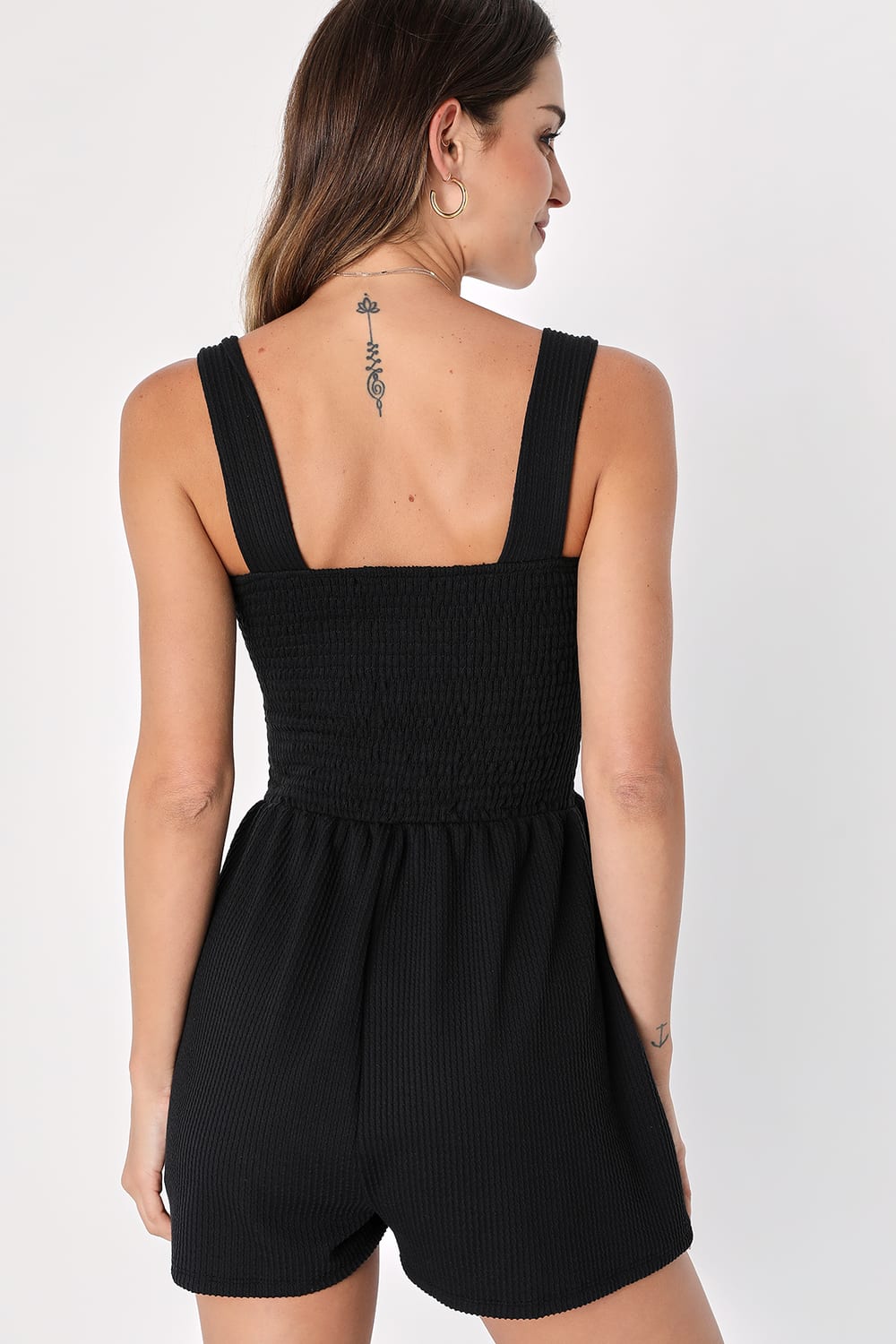 Social Calendar Black Ribbed Knit Smocked Romper