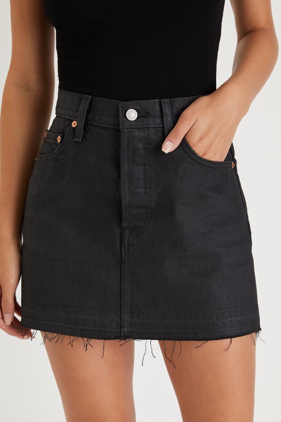 Shop Levi's Icon Black Coated Raw Hem Denim Mini Skirt