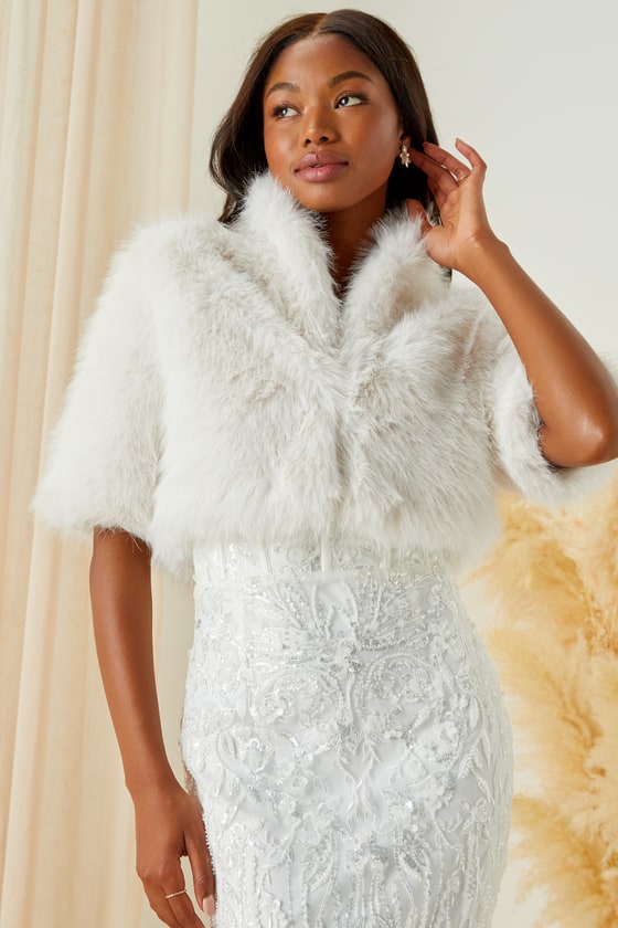 Dramatic Attitude Ivory Faux Fur Short Sleeve Cropped Jacket