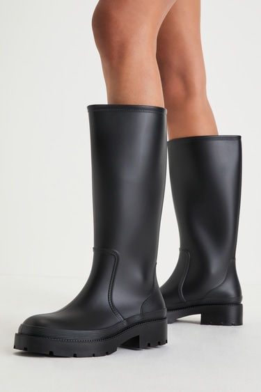 Neeve Black Lug Sole Knee-High Rain Boots
