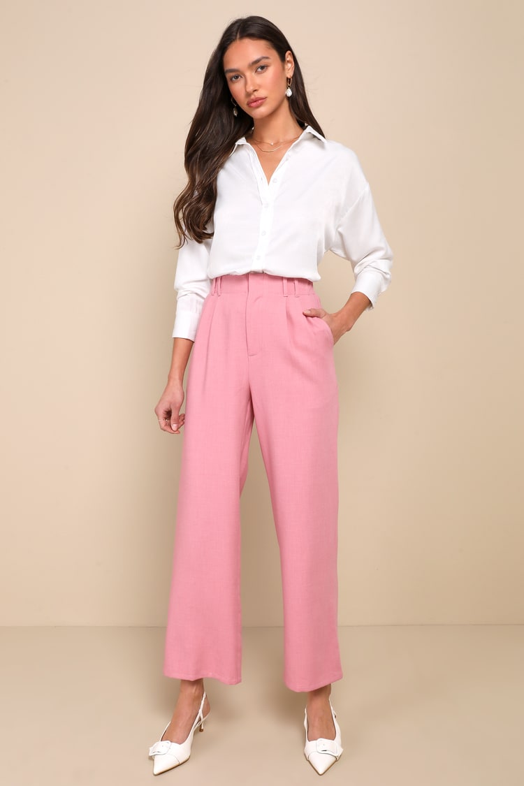 high waisted light pink trousers