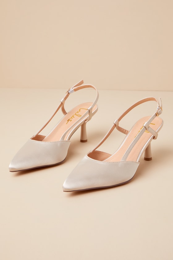 ALAÏA Women's White LE CŒUR SLINGBACKS IN PATENT LAMBSKIN | ALAÏA US