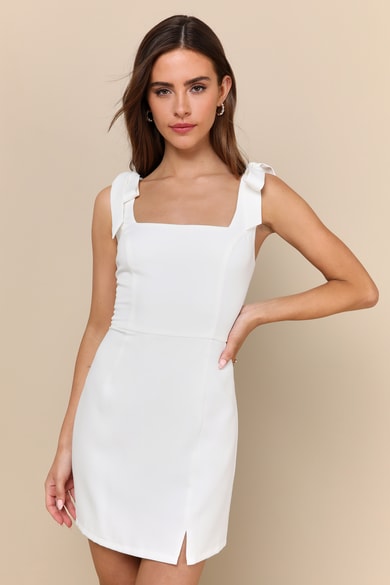 Long Sleeve Cross Over Strap Mini Dress in Cream