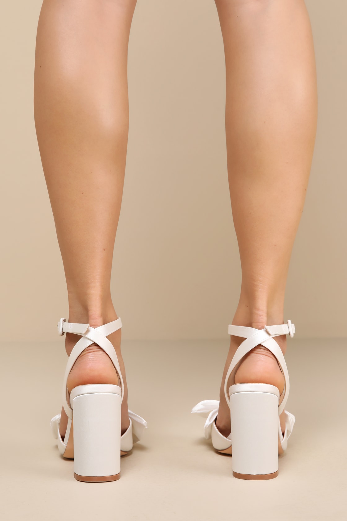 Suttonn Ivory Satin Bow Ankle Strap Pointed-Toe Pumps