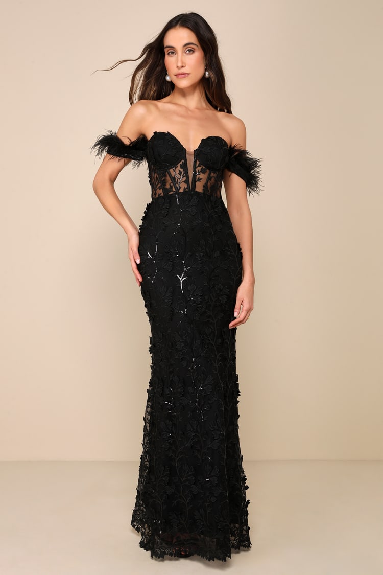 black dress with feathers on shoulders