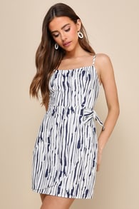 Exceptional Getaway White and Blue Striped Faux Wrap Mini Dress
