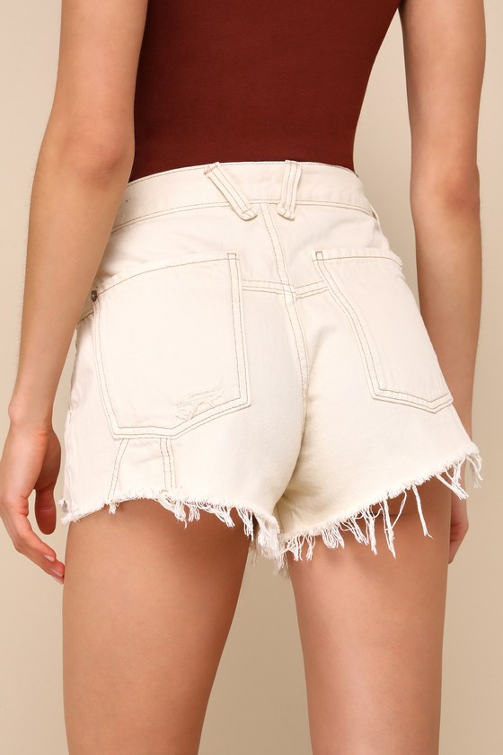 Shop Free People Now Or Never Ecru High-rise Distressed Denim Shorts In White