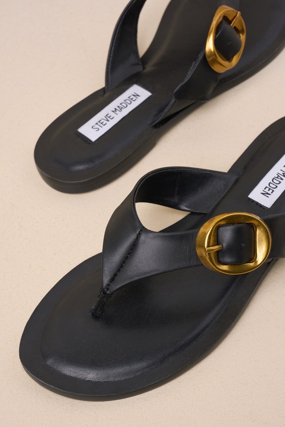 Shop Steve Madden Rays Black Leather Buckle Flat Thongs Sandals